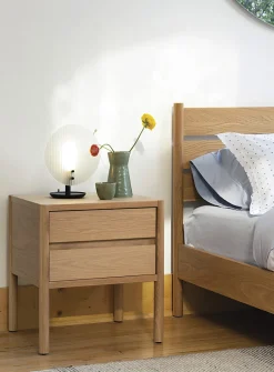 Sleek oak bedside table