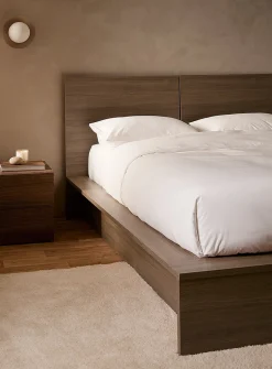 Sleek oak platform bed frame