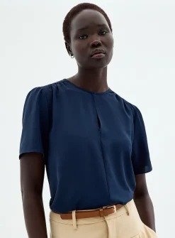 Slit-collar flowy crepe blouse