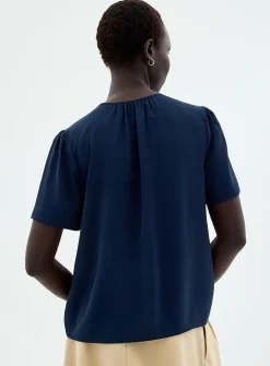 Slit-collar flowy crepe blouse