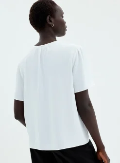 Slit-collar flowy crepe blouse