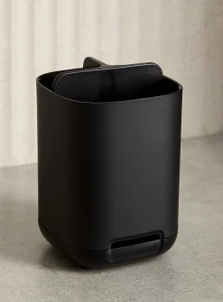 Small black toothbrush holder