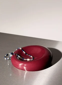 Small burgundy rounded tray
