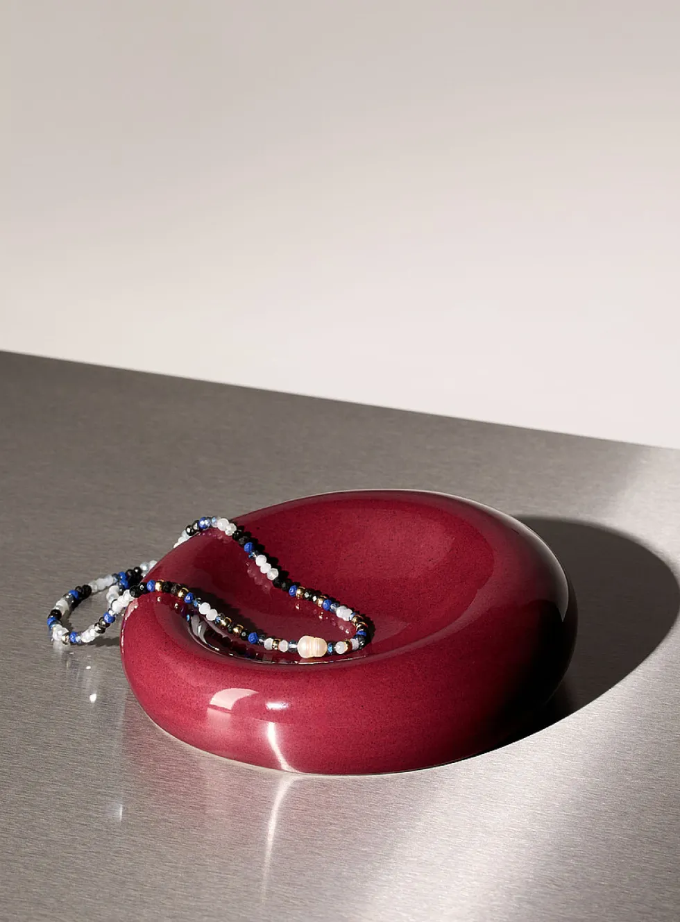 Small burgundy rounded tray
