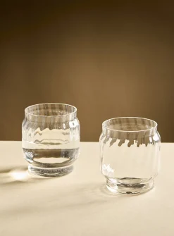 Small colourful blown-glass glasses