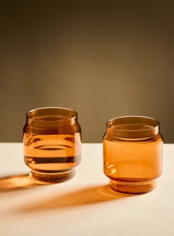 Small colourful blown-glass glasses