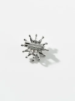Small golden-star brooch