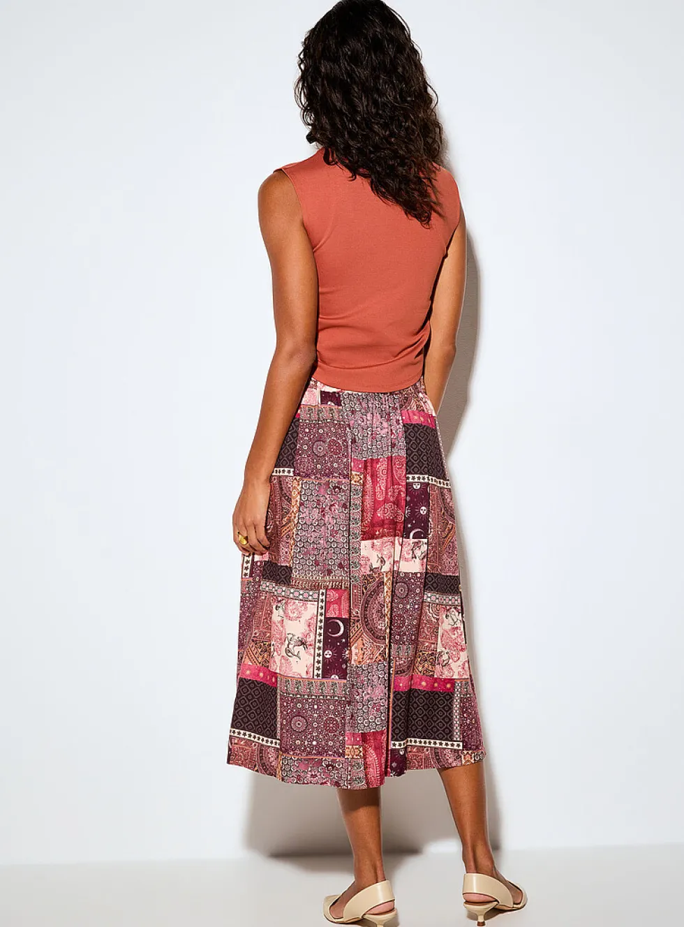 Small-button flared midi skirt