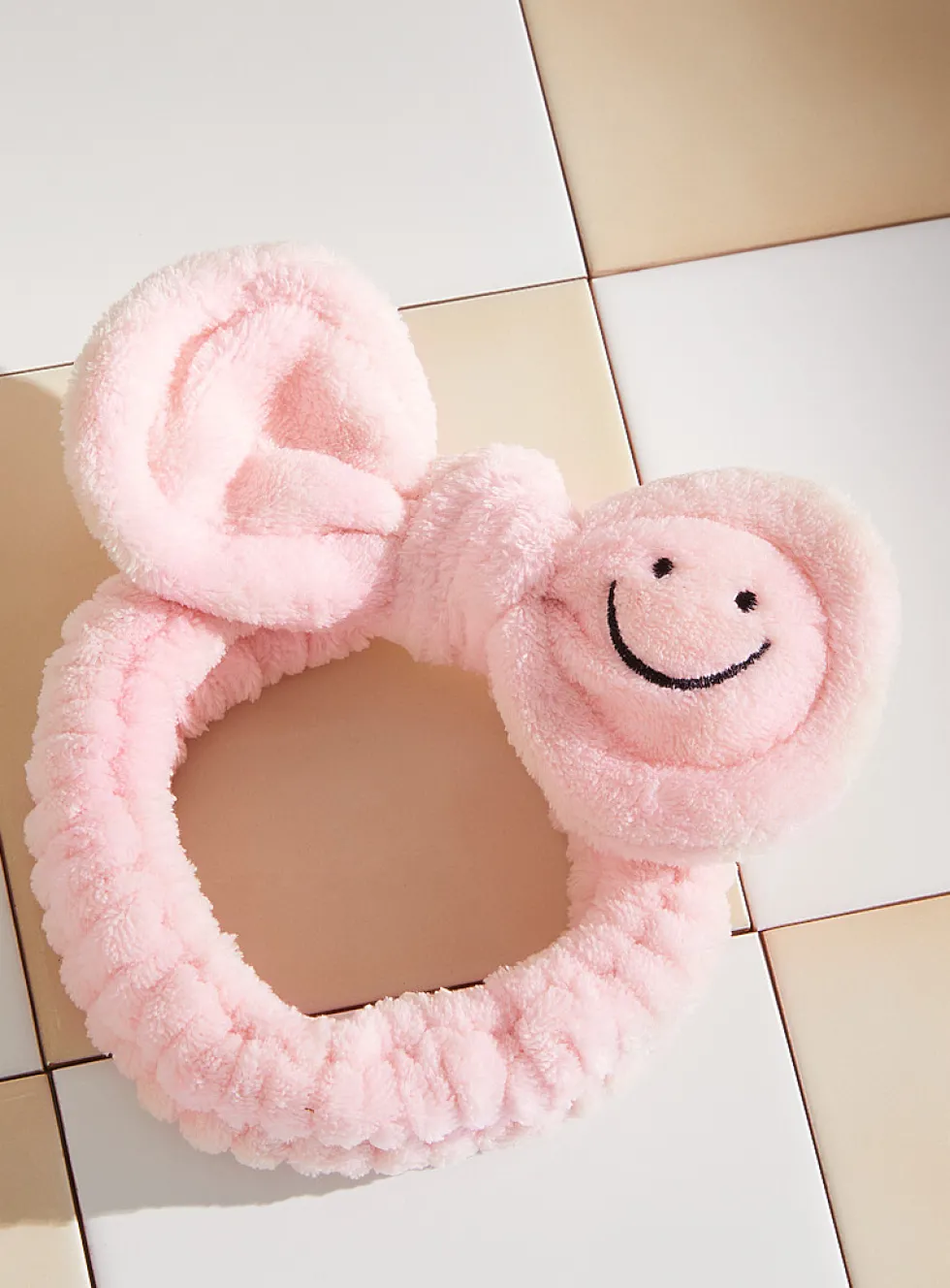 Smiley face bow plush headband