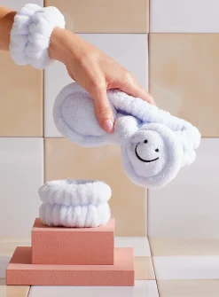 Smiley face bow plush headband