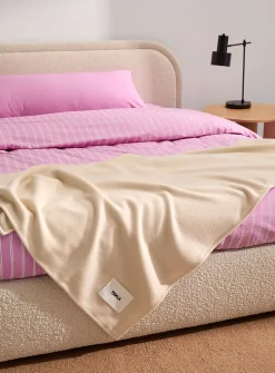 Snow 100% lambswool ivory throw
