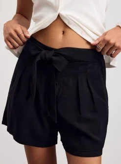 Soft supple denim belted pleated short