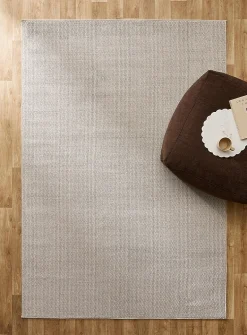 Solid beige bouclé rug
