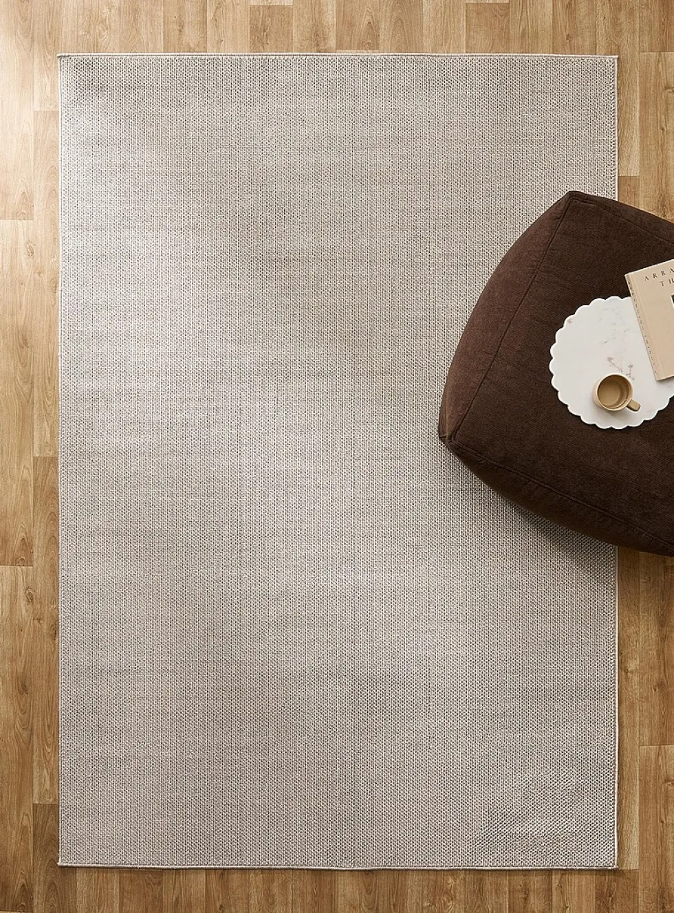 Solid beige bouclé rug