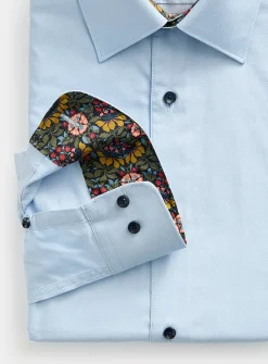 Solid floral-trim shirt