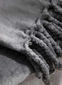 Solid soft plush fringed throw