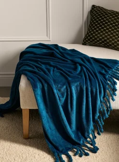 Solid soft plush fringed throw