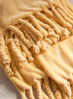 Solid soft plush fringed throw