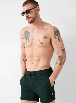 Solid swim trunk