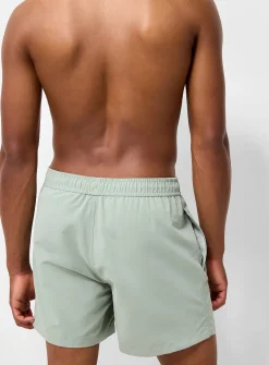 Solid-coloured swim short