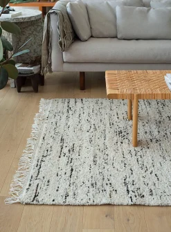 Speckled ivory artisanal rug