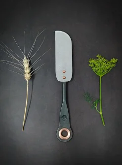 Stainless steel and copper cheese knife