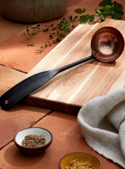 Steel and copper ladle
