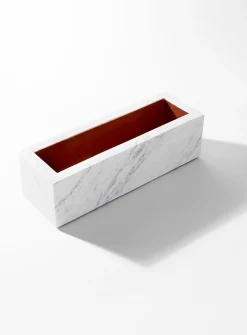 Stone-carved catchall