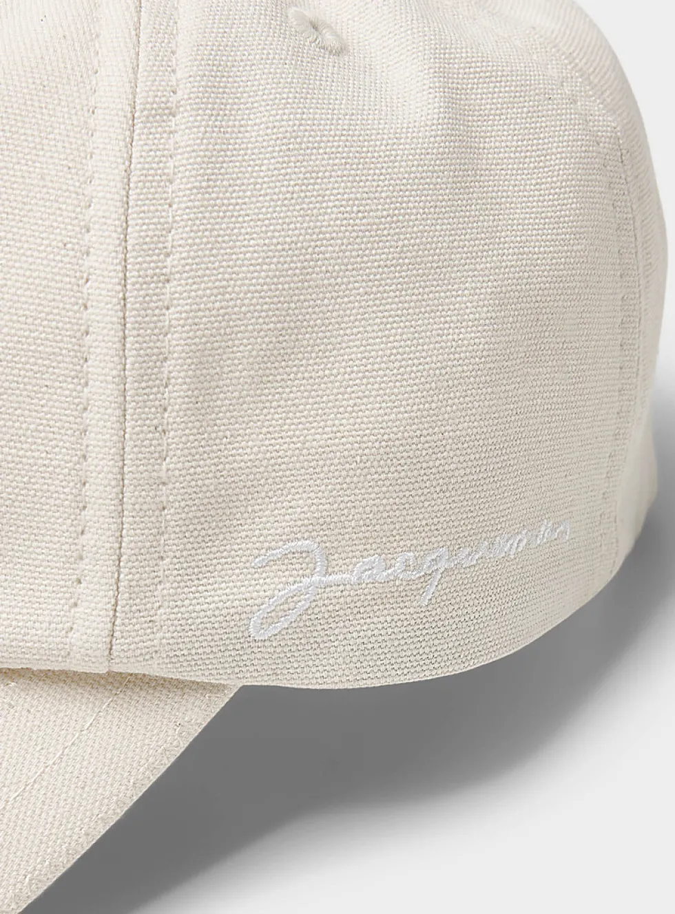 Streamlined logo cap