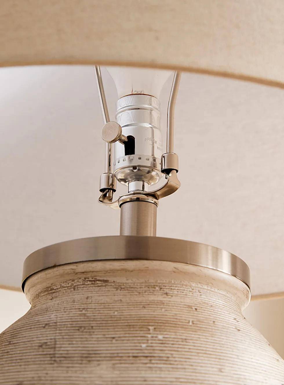 Striated concrete table lamp