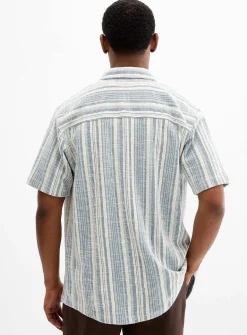 Striped bouclé-knit shirt
