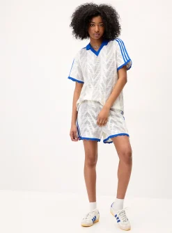 Striped pointelle knit polo shirt
