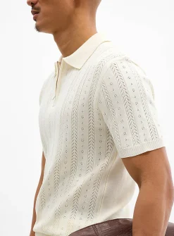 Striped pointelle-knit zip polo
