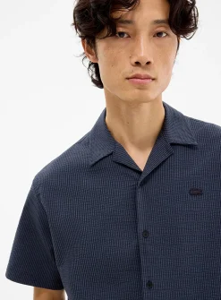 Striped seersucker camp shirt