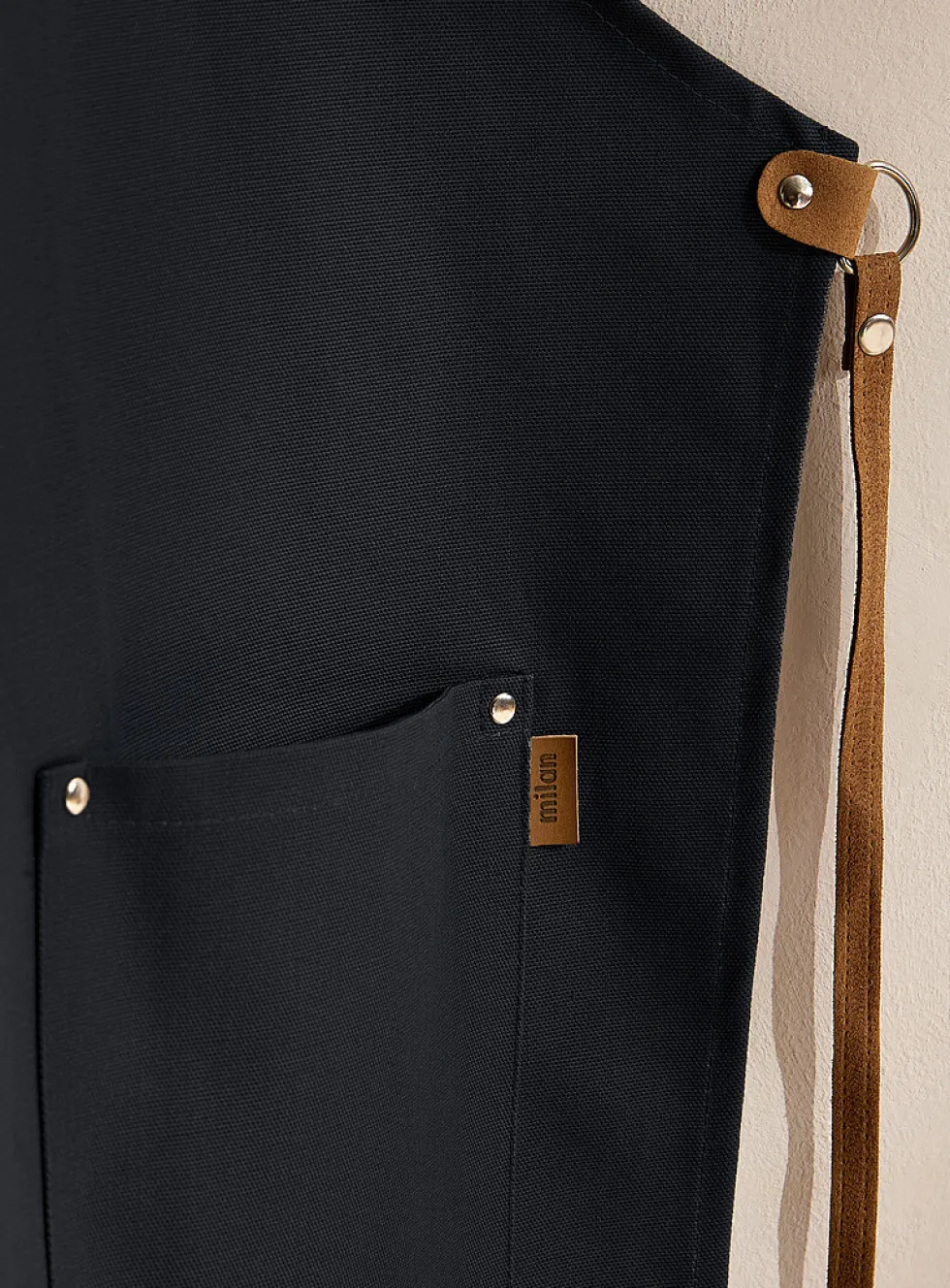 Suede accents coloured apron