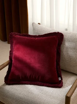 Sumptuous velvet fringed removable-cover cushion