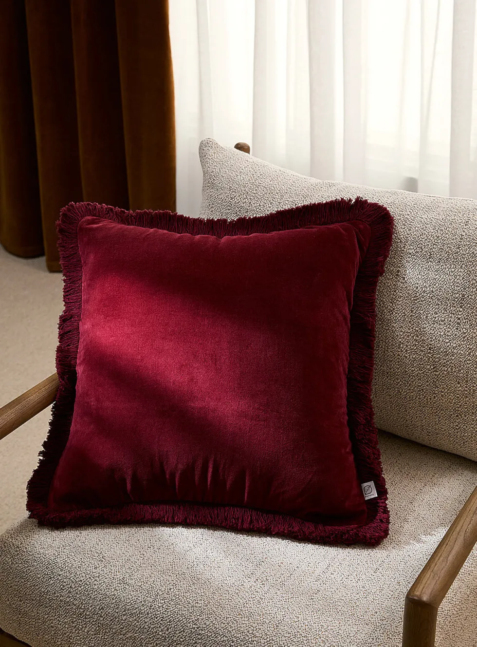 Sumptuous velvet fringed removable-cover cushion