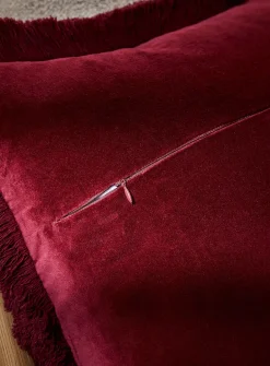 Sumptuous velvet fringed removable-cover cushion