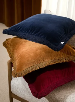 Sumptuous velvet fringed removable-cover cushion