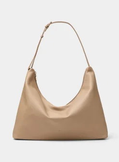 Supple trapezoidal hobo bag