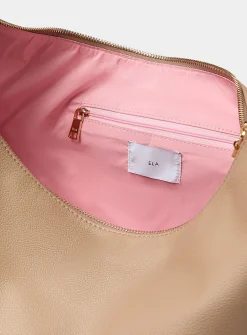 Supple trapezoidal hobo bag