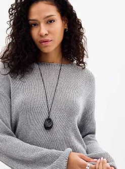Supple weave loose sweater