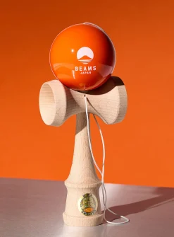 Tangerine ball wooden bilbo-catcher