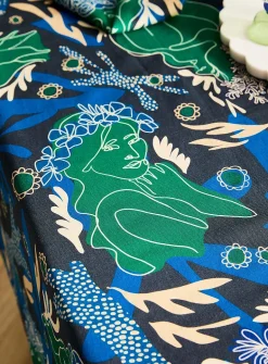Tasselled colourful tablecloth