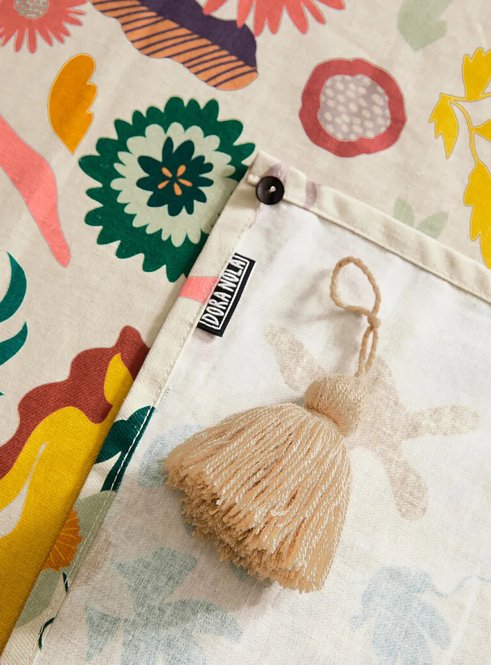 Tasselled colourful tablecloth