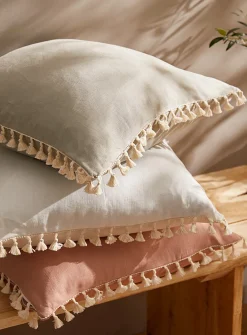 Tasselled linen cushion cover