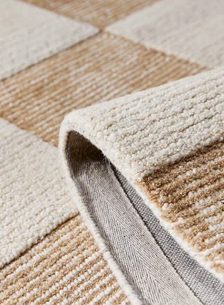 Textured checkerboard artisanal rug