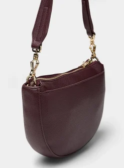 Textured half-moon crossbody bag