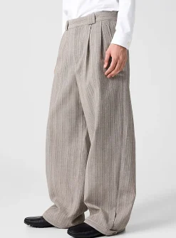 Textured virgin wool barrel-leg pants