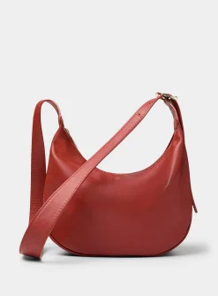 Textured-leather half-moon crossbody bag